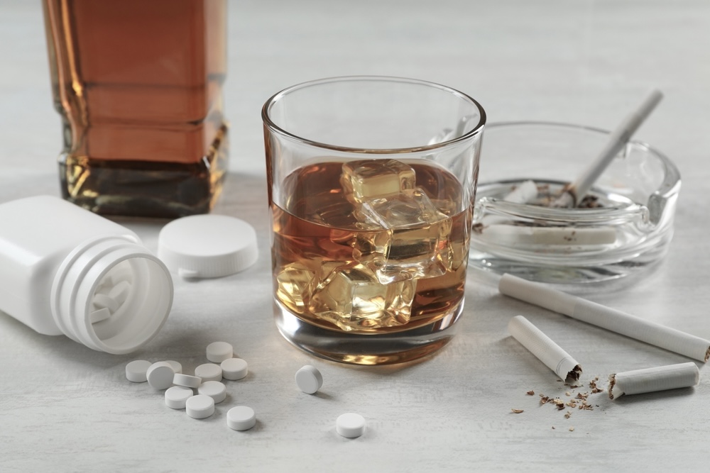 Alcohol and drugs on top of a table