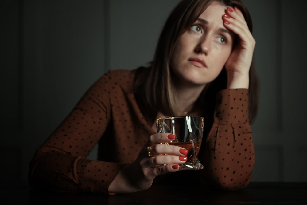 Female thinking of getting alcohol addiction treatment