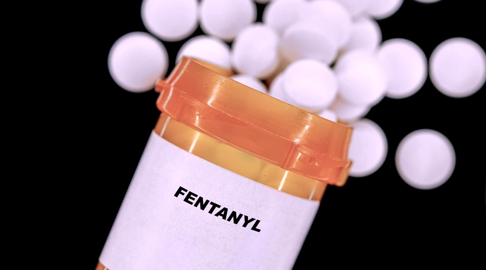 Image with Fentanyl in orange medicine bottle